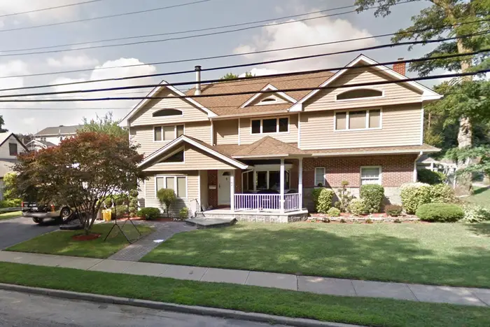 The Farmingdale address where a 25-year-old was shot on Tuesday